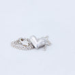 Load image into Gallery viewer, Delicate silver heart with chain and lobster clasp gathered close to it's side