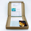 Load image into Gallery viewer, Inside of Found by You bespoke gift box. Box is brown with logo at top right, origami pouch below and step by step instructions underneath