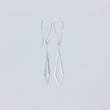 Load image into Gallery viewer, Dancing Kite earrings - showing one facing front and the other to side, on white background