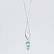 Load image into Gallery viewer, Close up shot of the Dancing Kite, handmade necklace in sterling silver