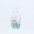 Load image into Gallery viewer, Close up of Spindrift earrings with silver topside and copper underneath, green blue and clear beads dangling beneath