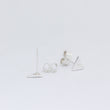 Load image into Gallery viewer, Ear posts of Slipstream stud, with butterfly back behind and earring with back attached