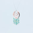 Load image into Gallery viewer, Front close up of Spindrift necklace showing copper and silver handmade with clear and various shades of green seed beads below