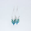 Load image into Gallery viewer, Close up of Windhcharm earrings, displayed close to each other with an overlap on white background