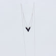 Load image into Gallery viewer, Close up of the handmade Zephyr silver necklace, showing chain loops where the pendant joins to the chain draped on either side