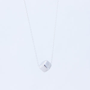 Tiny silver cube necklace on thin silver chain