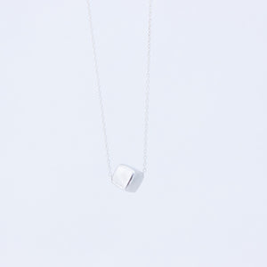 Delicate and unusual silver cube necklace, set on a fine chain
