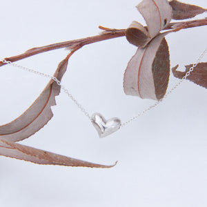 Delicate and unusual silver cube necklace, set on a fine chain
