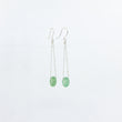 Load image into Gallery viewer, Green gemstone and silver chain earrings on white background
