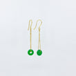 Load image into Gallery viewer, Dangly jade gemstones earrings on 18ct gold-plated sateliite chain, side view on white background
