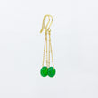 Load image into Gallery viewer, Green gemstone and gold-plated chain earrings on white background

