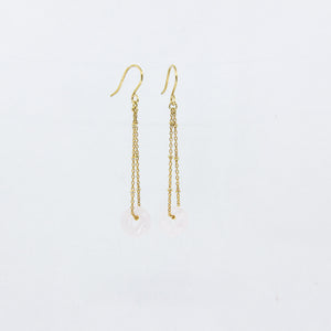 18ct gold-plated dangle earrings with delicate pink gemstones on a white background