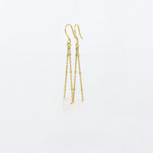 Dangly rose quartz gemstones earrings on 18ct gold-plated sateliite chain, side view on white background