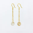 Load image into Gallery viewer, Translucent gemstone and gold-plated chain earrings on white background
