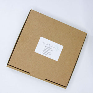 Gift box showing address that box is returned to with chosen found treasure, before being returned as a piece of bespoke jewellery