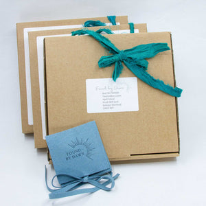 Gift box with beautiful teal ribbon and pretty blue pouch, in which finished piece of jewellery will be returned once made. 