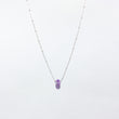 Load image into Gallery viewer, Purple gemstone and silver chain necklace on white background
