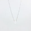 Load image into Gallery viewer, Handmade gemstone necklace with clear quartz and silver satellite chain, on white background
