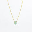 Load image into Gallery viewer, Handmade gemstone necklace with green gemstone and gold-plated satellite chain, on a white background
