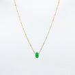 Load image into Gallery viewer, Deep green gemstone and gold-plated chain necklace on white background
