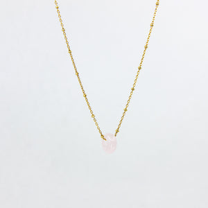 18ct gold-plated necklace with a rose quartz gemstone pendant on white background