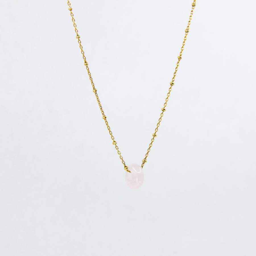 18ct gold-plated necklace with a rose quartz gemstone pendant on white background