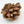 Load image into Gallery viewer, Circle gemstone pendant necklace with gold-plated chain on pine cone
