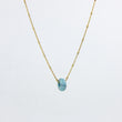 Load image into Gallery viewer, Circle gemstone pendant necklace with gold-plated satellite chain through, close up
