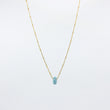 Load image into Gallery viewer, Turquoise gemstone and gold-plated necklace on white background
