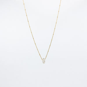 18ct gold-plated necklace with a white agate gemstone pendant on white background