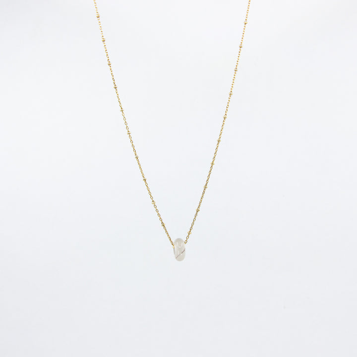 18ct gold-plated necklace with a white agate gemstone pendant on white background