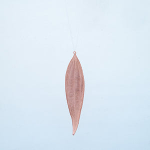 Front of copper bay leaf on silver chain, showing slight natural twist of leaf at bottom