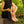 Load image into Gallery viewer, Model on tree stump wearing unique set of handmade silver jewellery: Tailwind bracelet, anklet and ring
