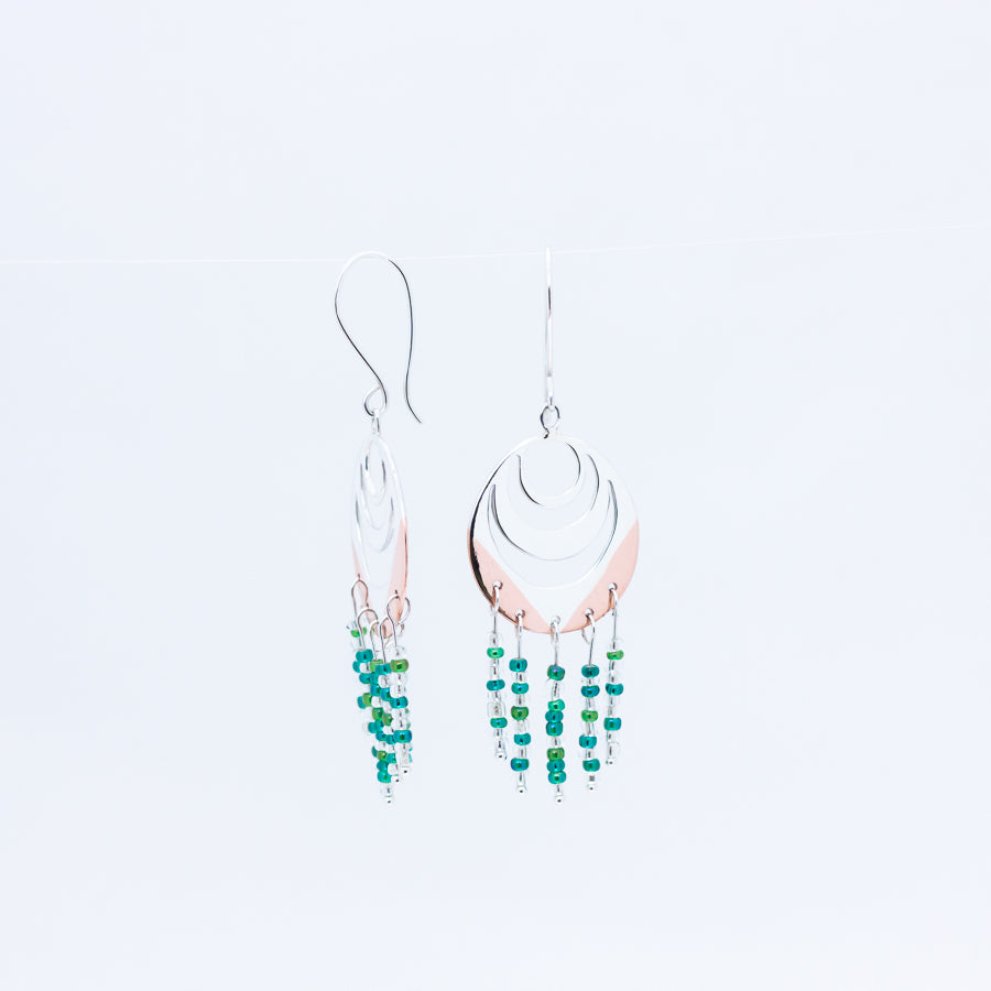 Close up of unusual handmade earrings, Spindrift design from Windblown Collection