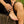 Load image into Gallery viewer, Model sitting on log wears Tailwind anklet with Tailwind ring on her fourth finger
