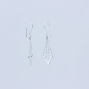 Zephyr silver earrings, one facing forward the other to the side to show profile