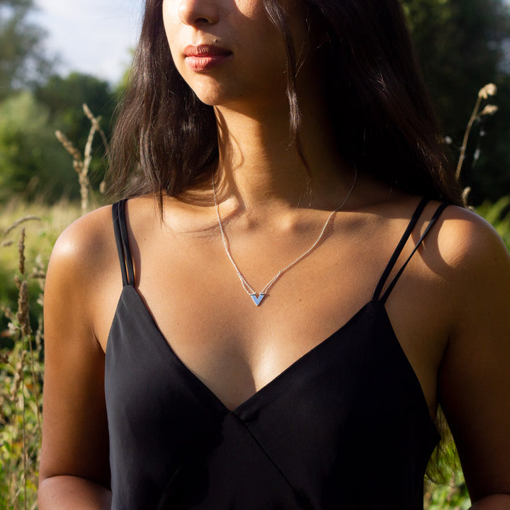 Unique handcrafted silver necklace of Zephyr design from the Windblown Collection